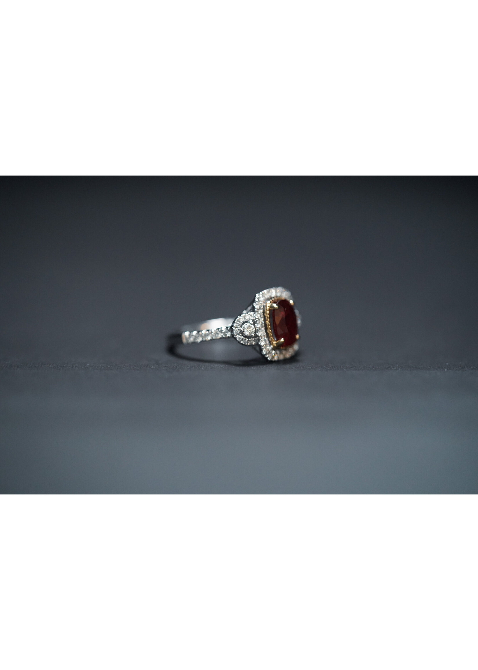 14KWY 4.82g .52ctw Diamond 1.60ct Oval Ruby Fashion Ring (size 7)