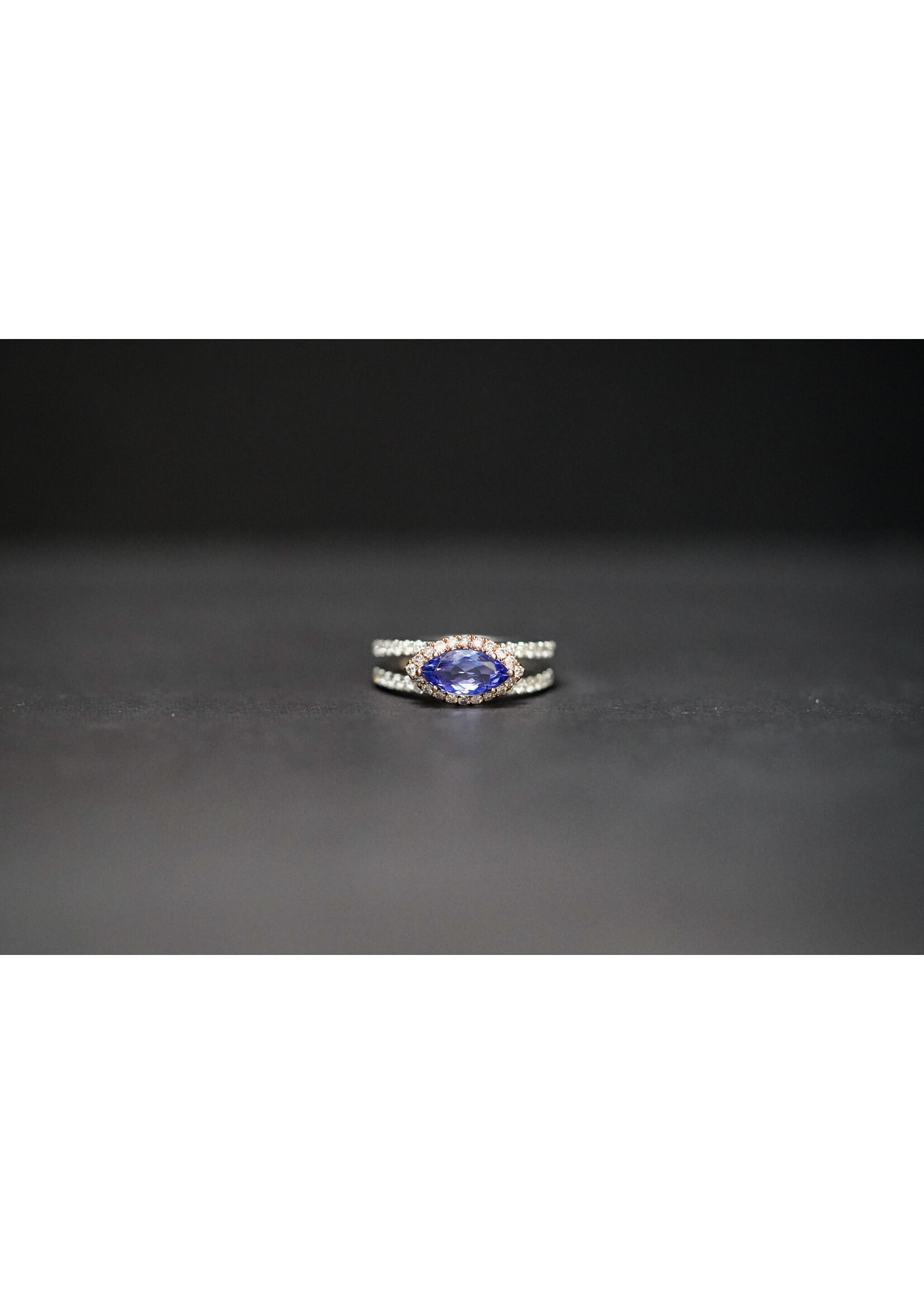 18KWR 4.61g 1.59ctw (1.10ctr) Tanzanite & Diamond Halo Fashion Ring (size 6.5)
