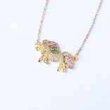 La Licornerie Golden sparkling galloping unicorn necklace