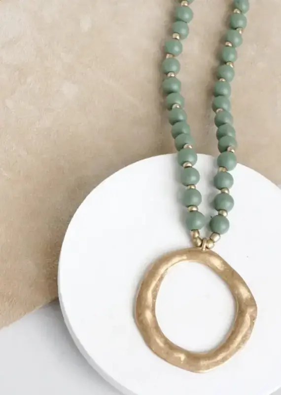 Pennyline Green Long Wood Bead Necklace with gold circle olive green