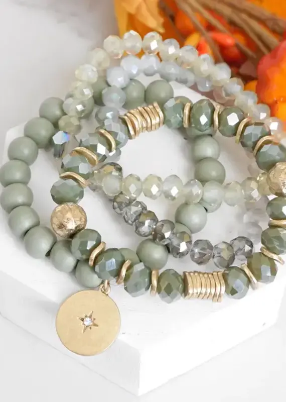 Pennyline Beaded bracelets stack in Olive green with a coin charm