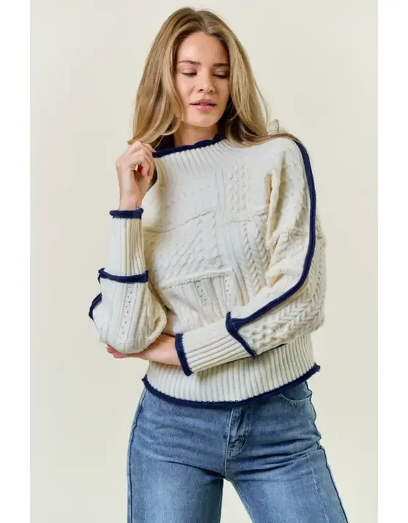 MOCK NECK KNIT SWEATER WITH CONTRAST LINE DETAIL