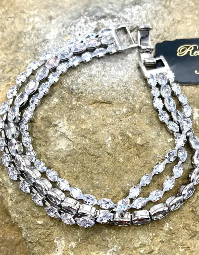 Triple‑Strand Stainless Steel Bracelet with Oval Crystal