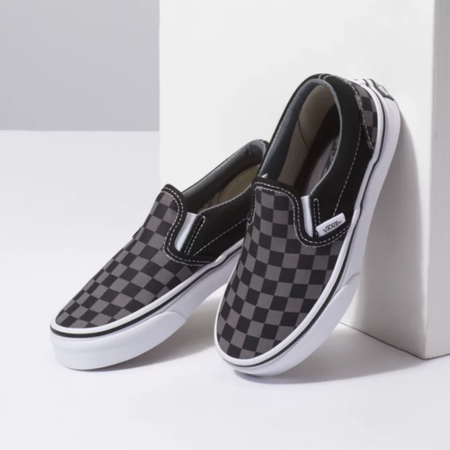 black slip on vans youth