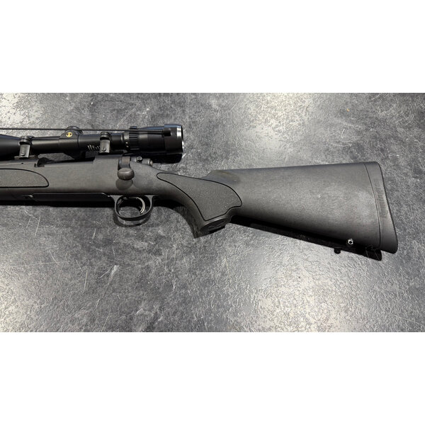 Remington 700 SPS Left Hand 7mm Rem Mag 24" BBL w/Bushnell 3200 3-9 Scope