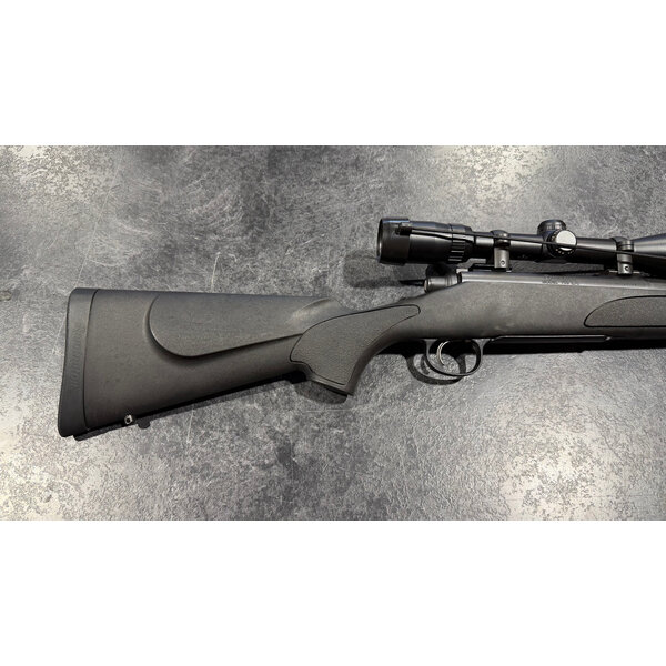 Remington 700 SPS Left Hand 7mm Rem Mag 24" BBL w/Bushnell 3200 3-9 Scope