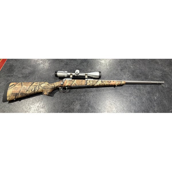 Savage Model 116 300 Win Mag Bear Hunter Stainless w/Nikon Prostaff 3-12 Scope