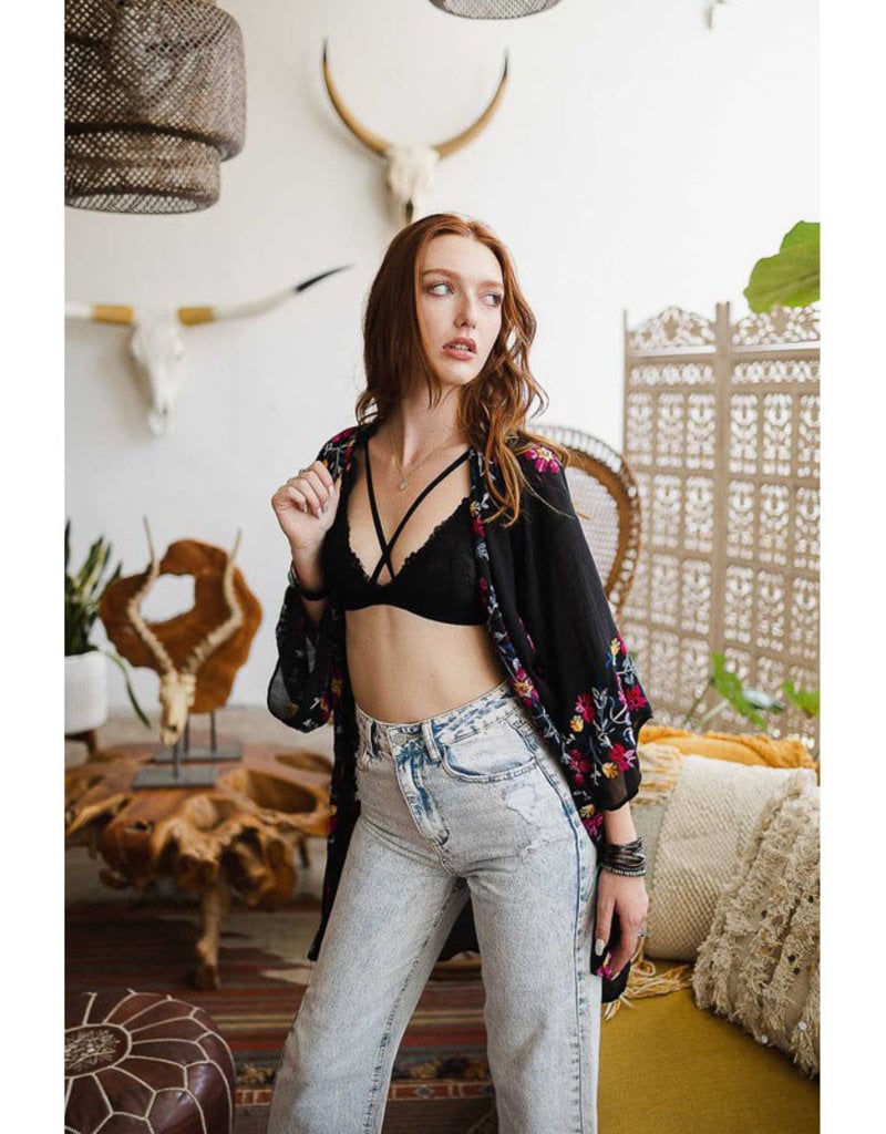 https://cdn.shoplightspeed.com/shops/627081/files/48417545/800x1024x1/leto-accessories-floral-cross-over-bralette.jpg