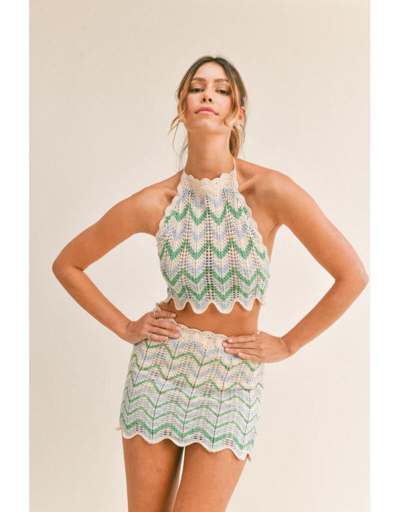 https://cdn.shoplightspeed.com/shops/627081/files/55764280/800x1024x1/mable-crochet-multi-color-halter-top-mini-skirt.jpg