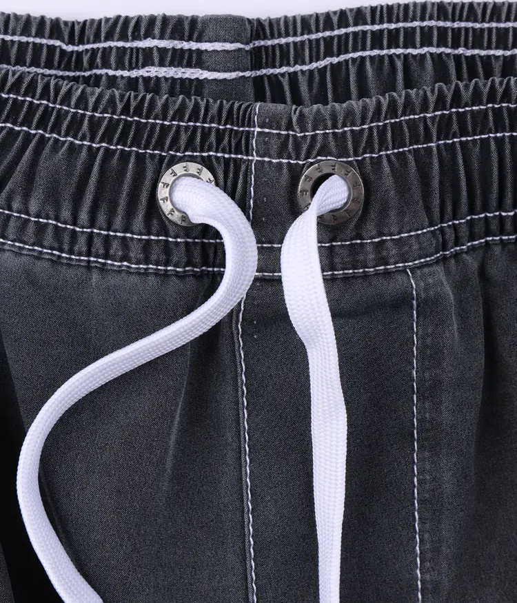 FORMER SWANS PUNCTURE 18" SWIM SHORT // BLACK