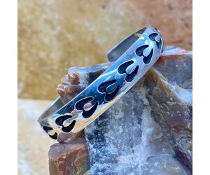 Deer track Hopi overlay silver cuff - White Buffalo