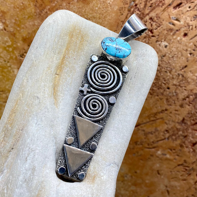 Long turquoise pendant by Alex Sanchez