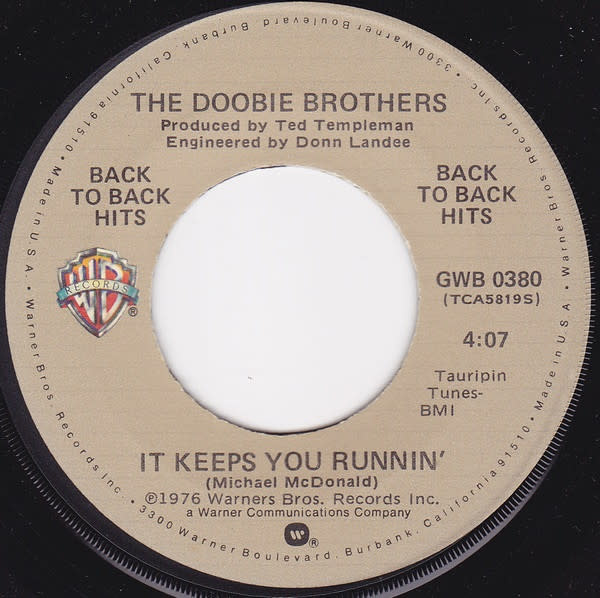 (VINTAGE) The Doobie Brothers - It Keeps You Runnin' / What A Fool Believes 7" single [VG+]