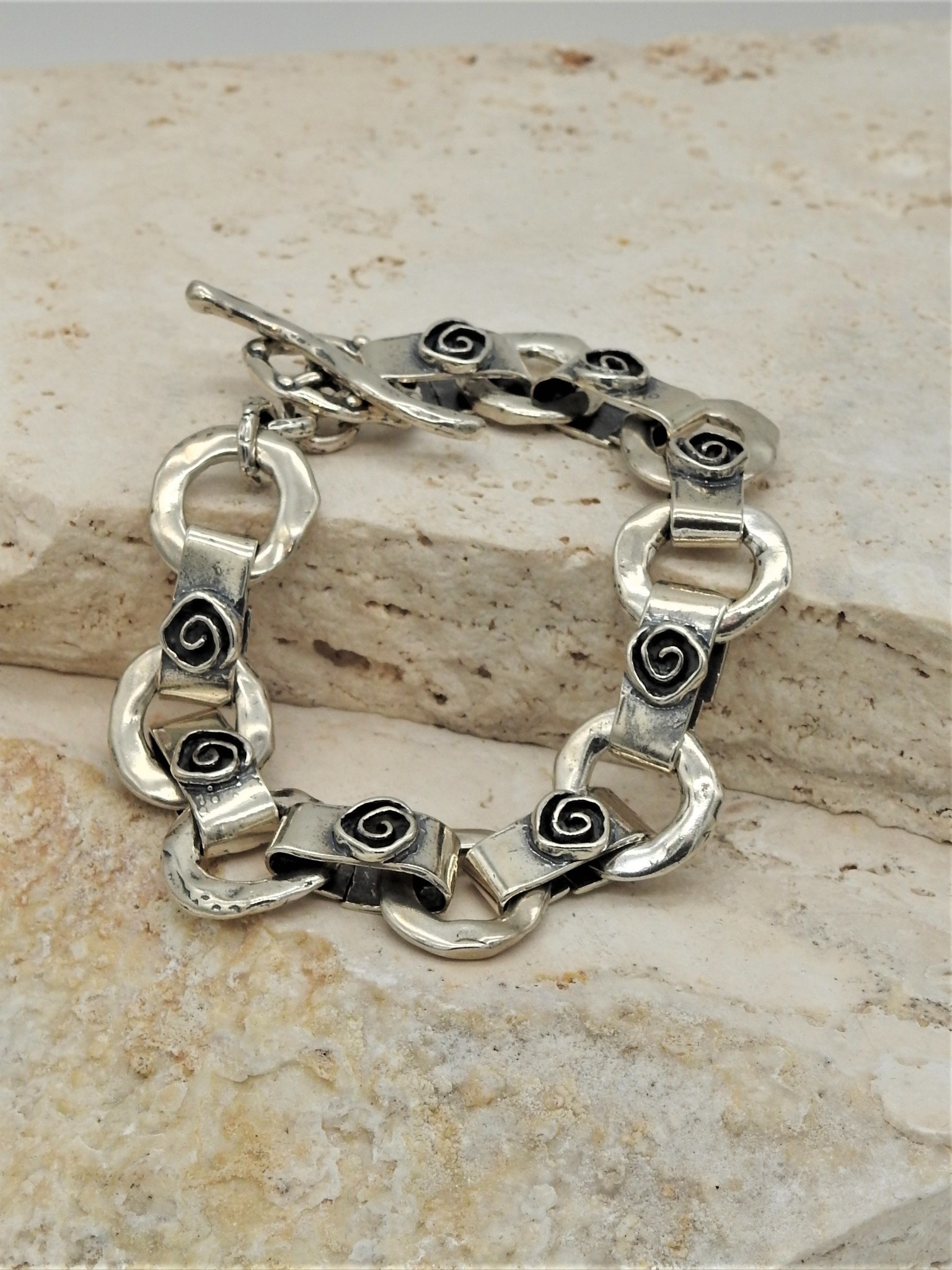 Pam Springall SS Rings, Square Spiral links w/ toggle clasp