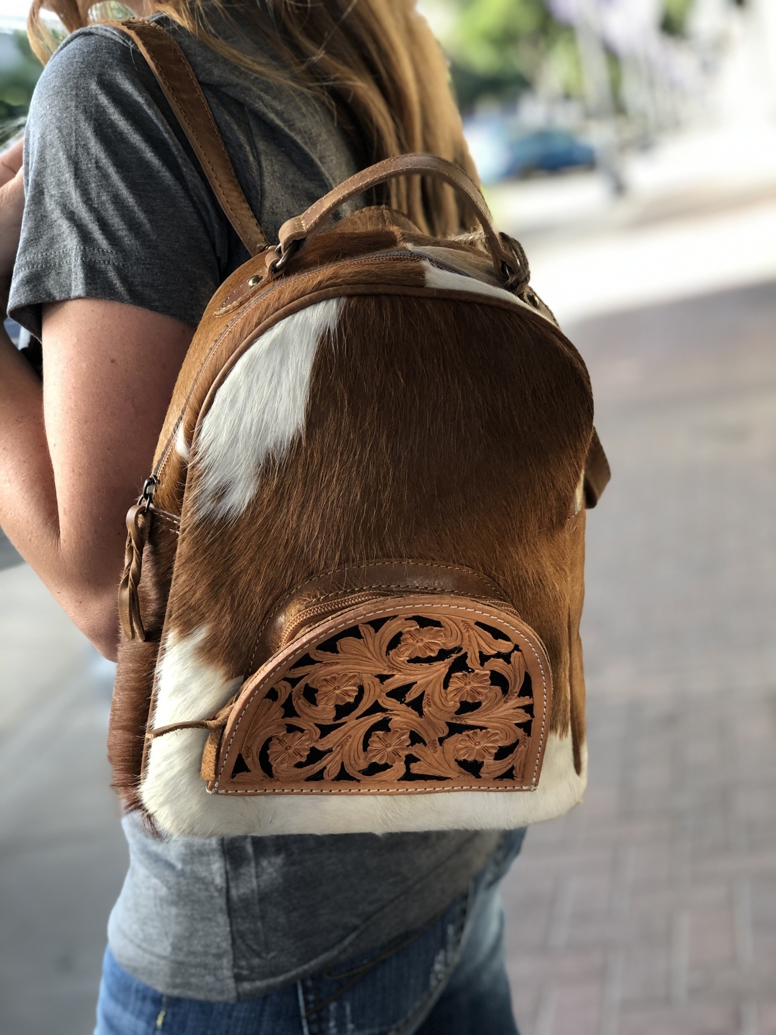 tooled leather backpack