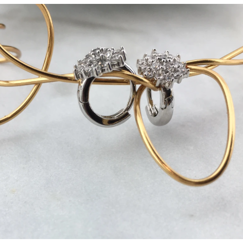 Pave Flower Huggie Earrings by Be-Je Pave Flower Huggie Earrings by Be-Je