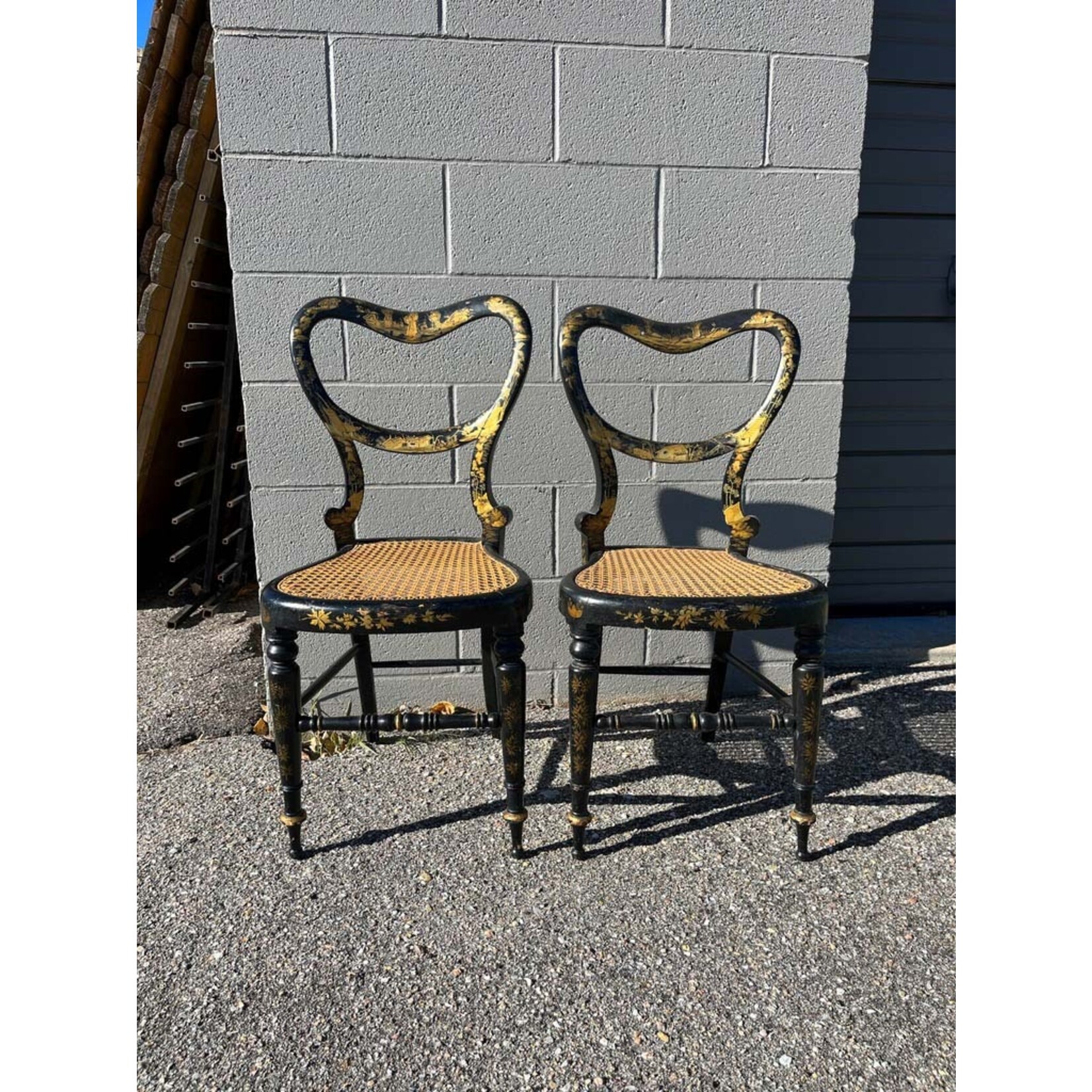 Ebonized and Gold Leaf Painted Regency Chairs, a Pair