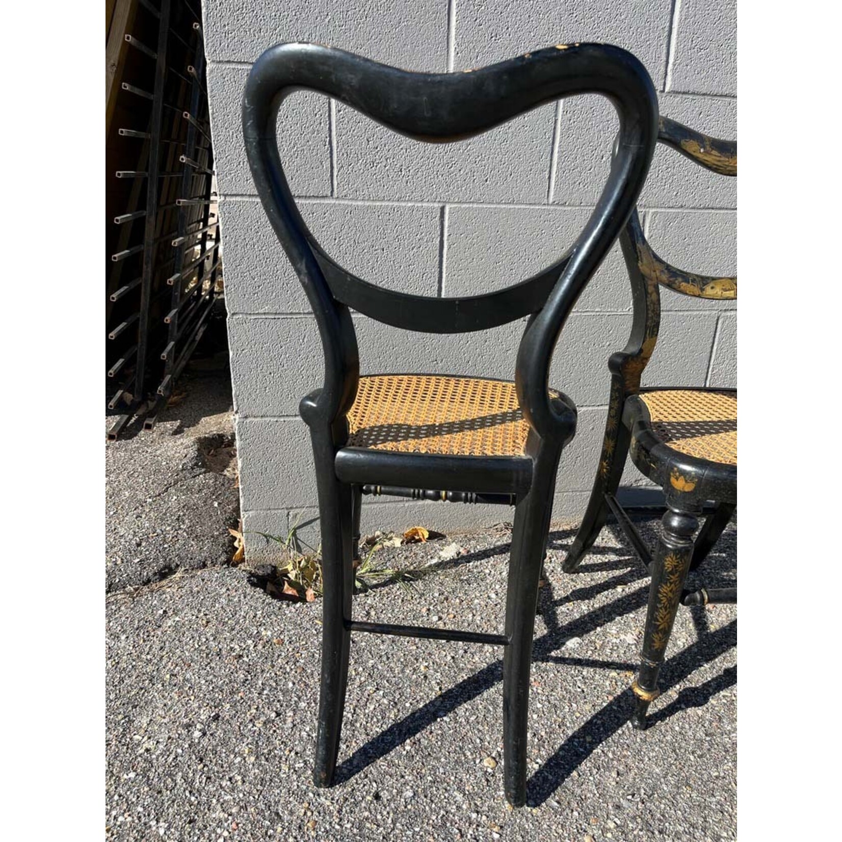 Ebonized and Gold Leaf Painted Regency Chairs, a Pair