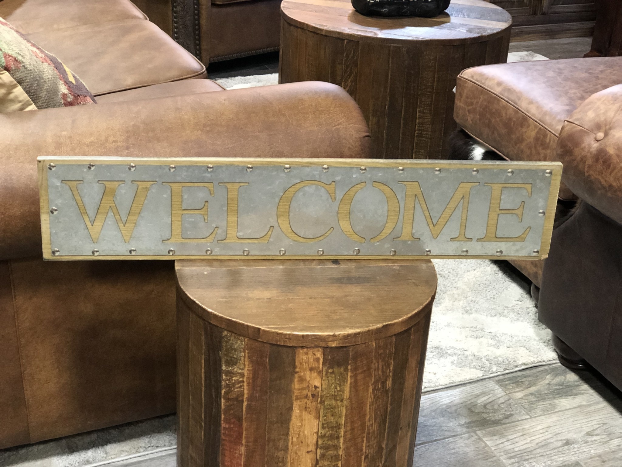 Welcome metal and wood sign