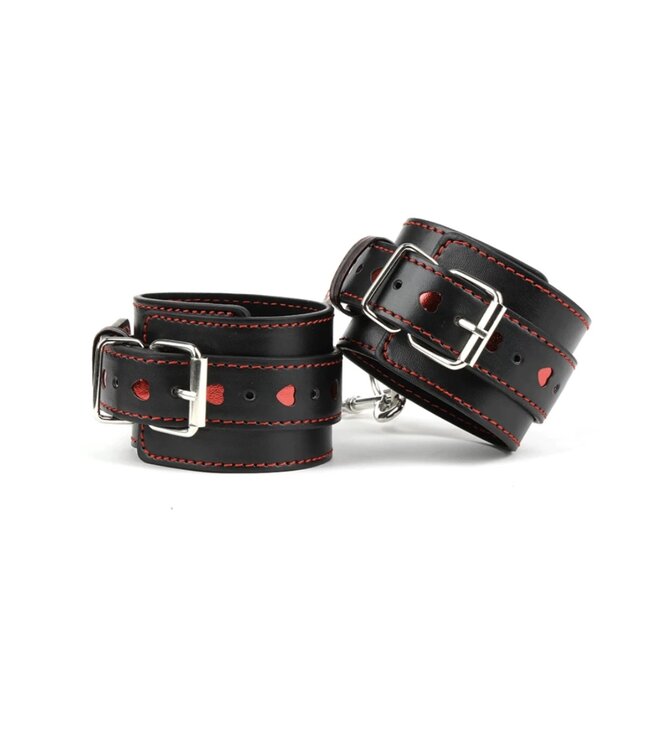 Wrist restraints with red hearts
