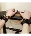 The model traitor Pony Leather Cuffs with Heart Padlocks
