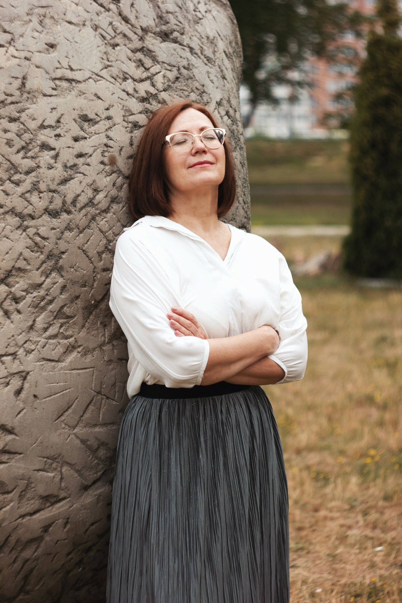 woman in classic blouse and skirt