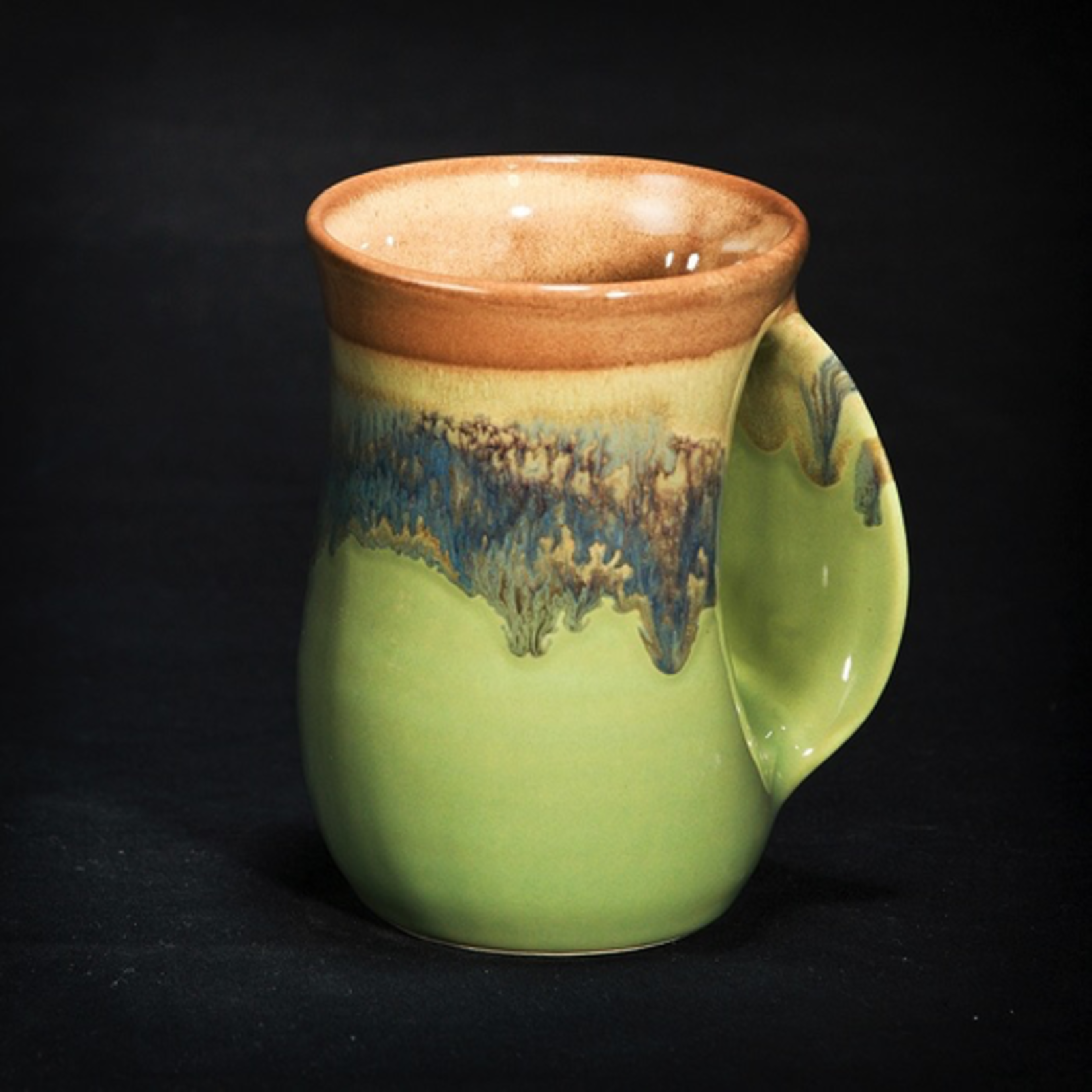 Misty Green Clay In Motion Hand Warmer Mug Left