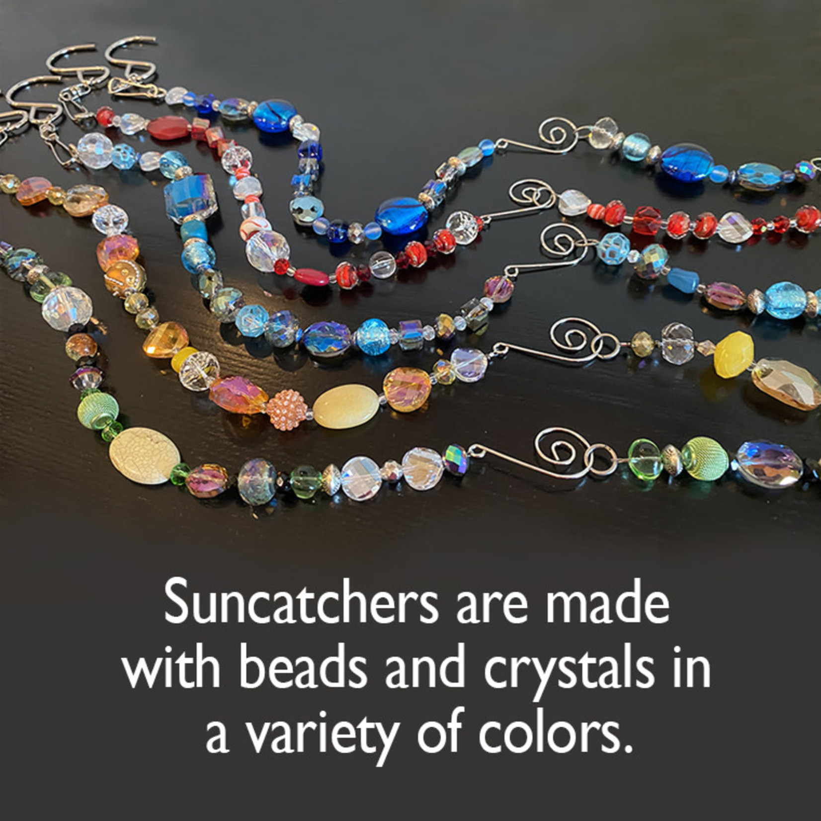 Susan Estrella Suncatcher, beads and crystals, @ 25"l, SUSE