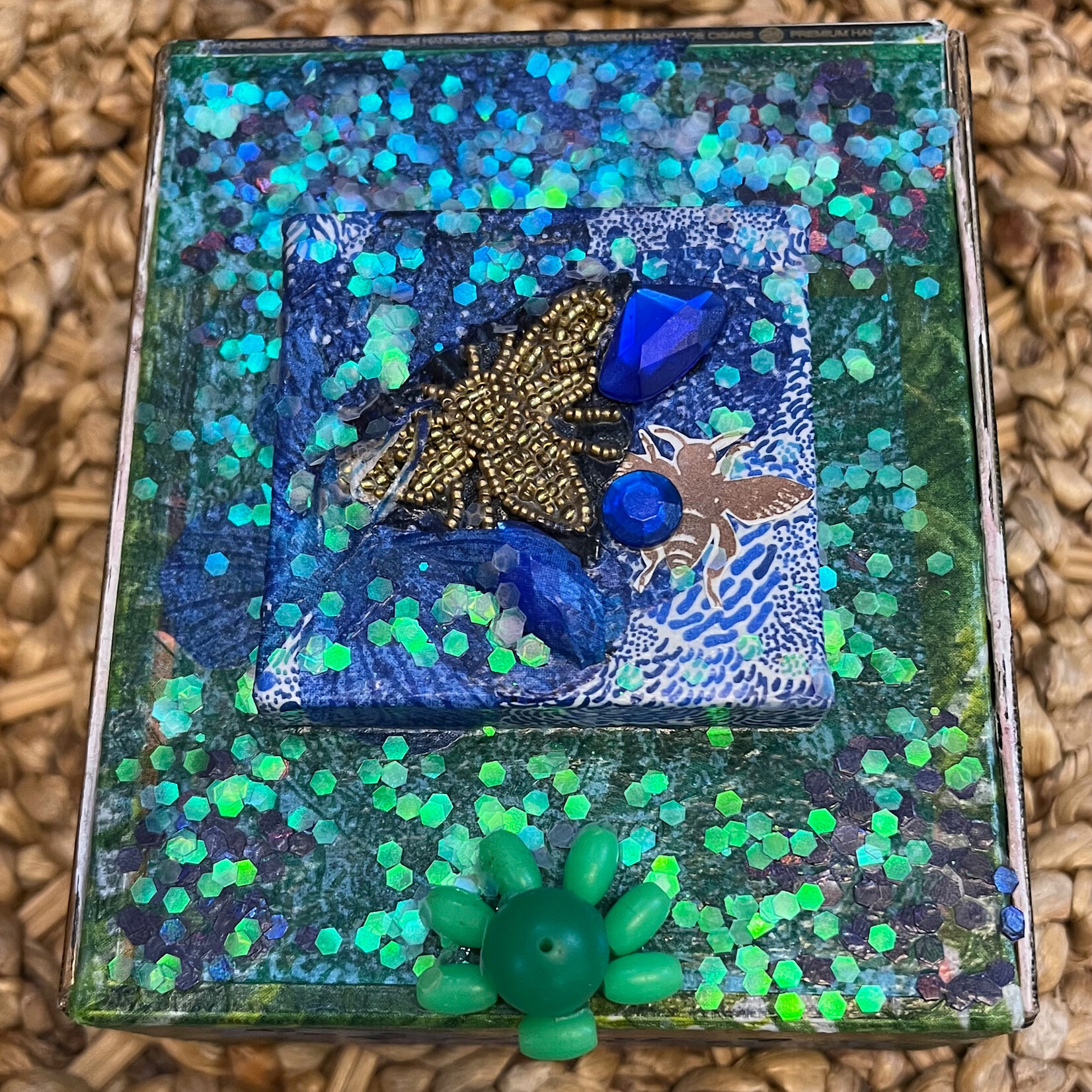 Pam Maschal Cigar box collage, blue/green butterfly, @5x5", PAMM