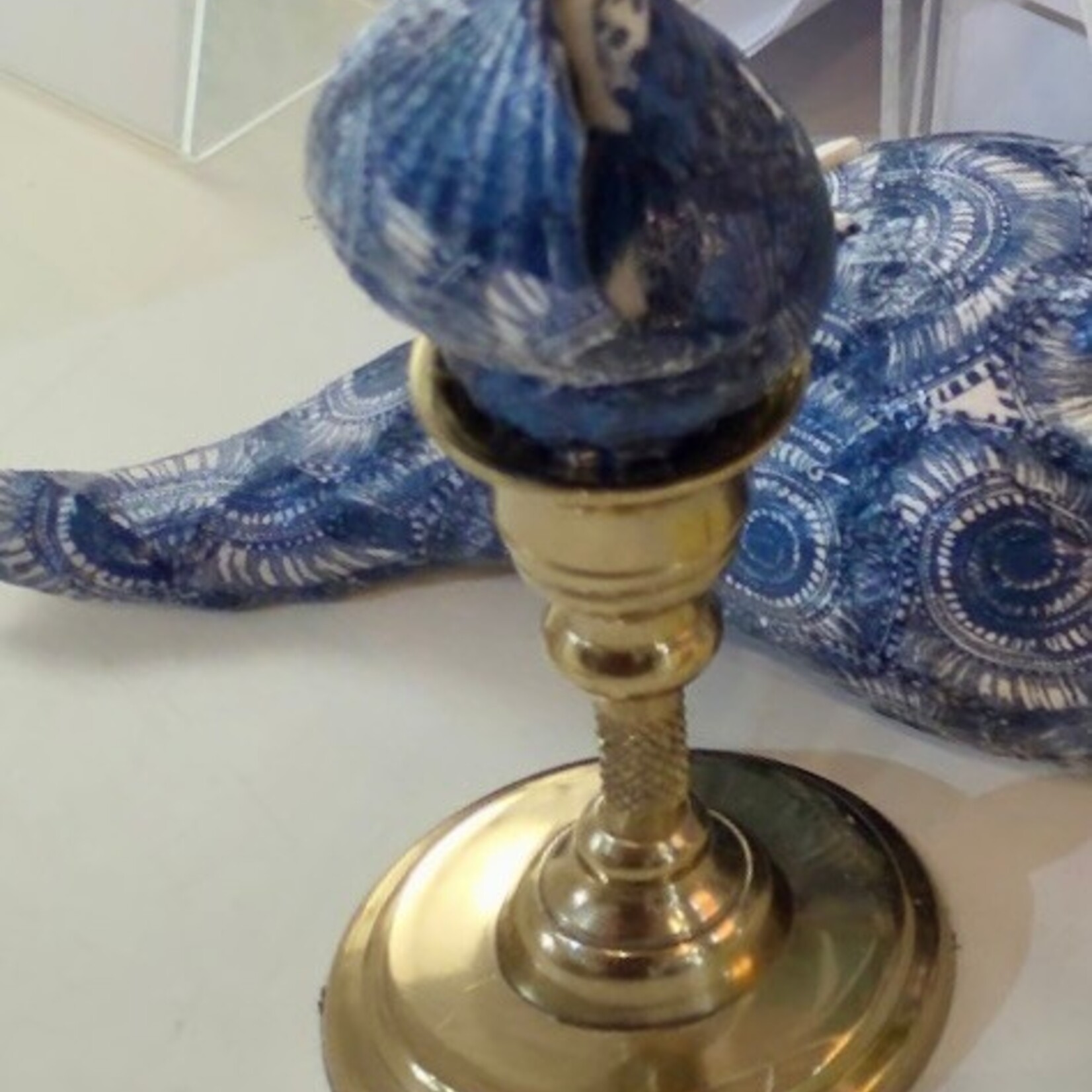 Pam Maschal Blue collaged shell on brass candlestick, PAMM