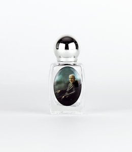 Bouteille de saint frère André contenant de l'eau bénite
