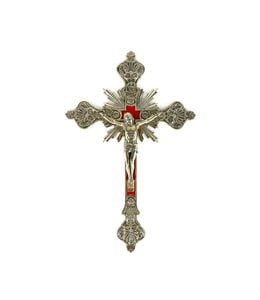 Brass crucifix with velvet background