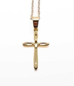 Pendant : rounded golden cross with textured center