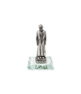 Antique pewter statue of Saint Brother André on glass