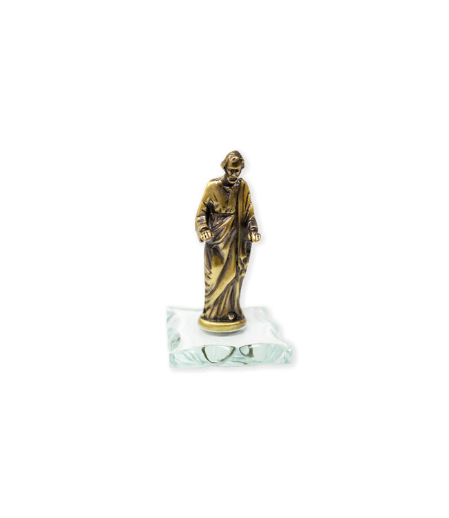 Antique golden statue of Saint Joseph blessing on glass