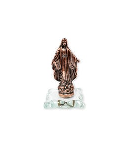 Miraculous antique coppery statue on glass