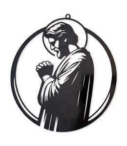 Black metal wall decoration of Saint Joseph in prayer