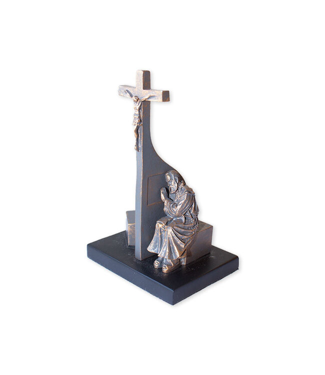 Timothy P. Schmalz Padre Pio Crucifix in the Confessional, “I Absolve You,” bronze-colored, on a black wooden base.