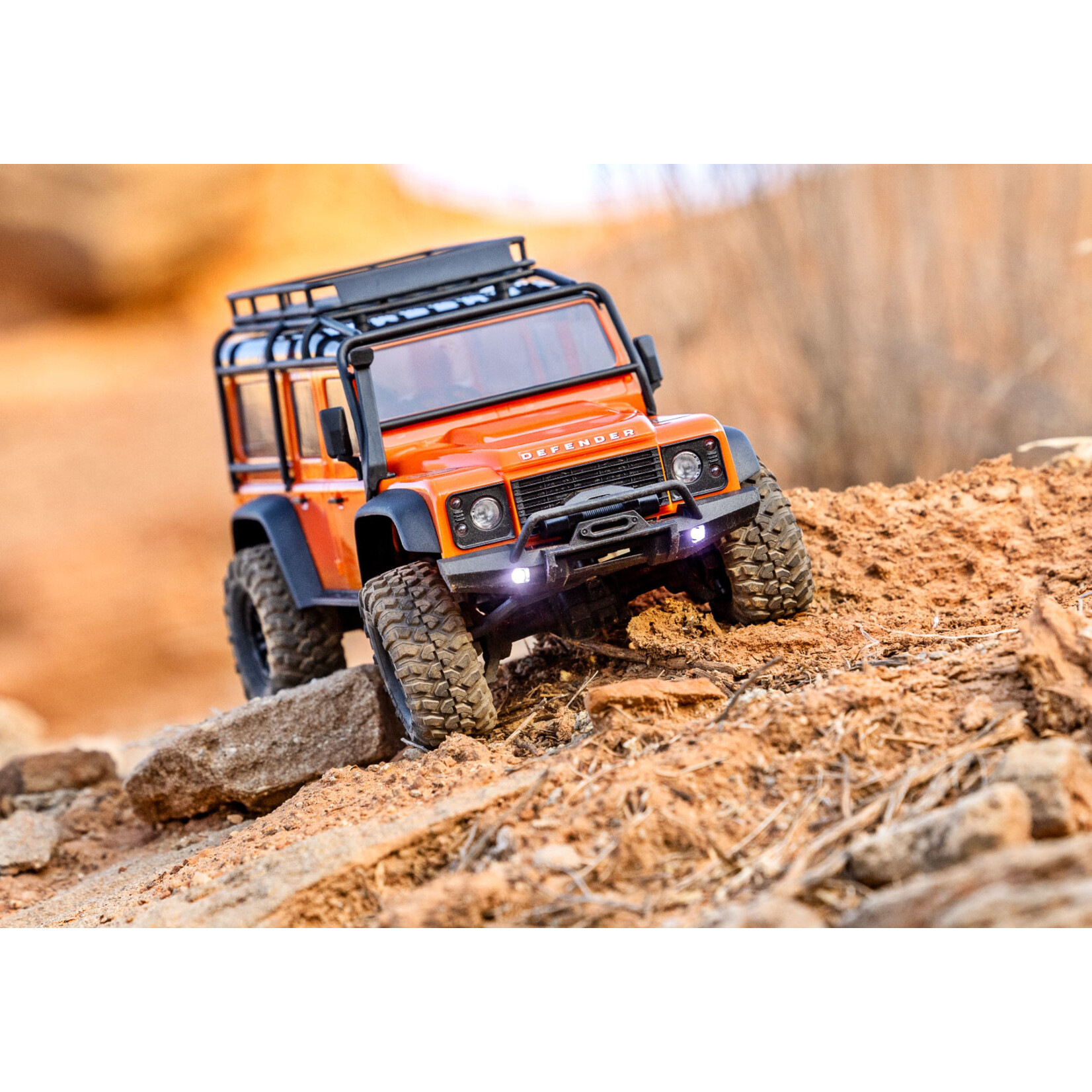 Traxxas 970541ORNG - 1/18 RTR Scale and Trail Defender - Orange