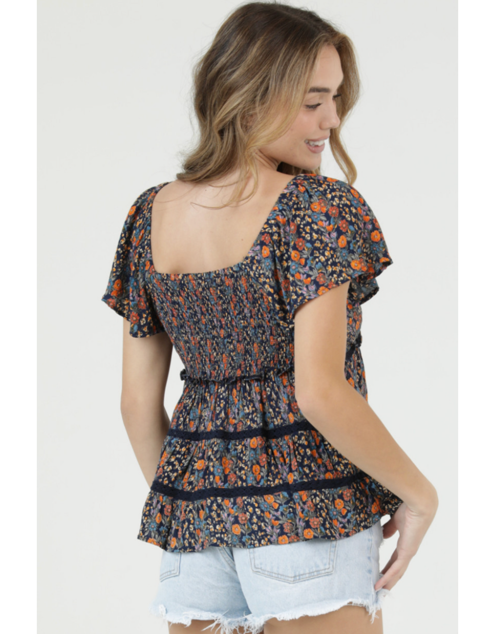 Flutter Sleeve Top with Ruffle Detail and Crochet Trim (Navy)