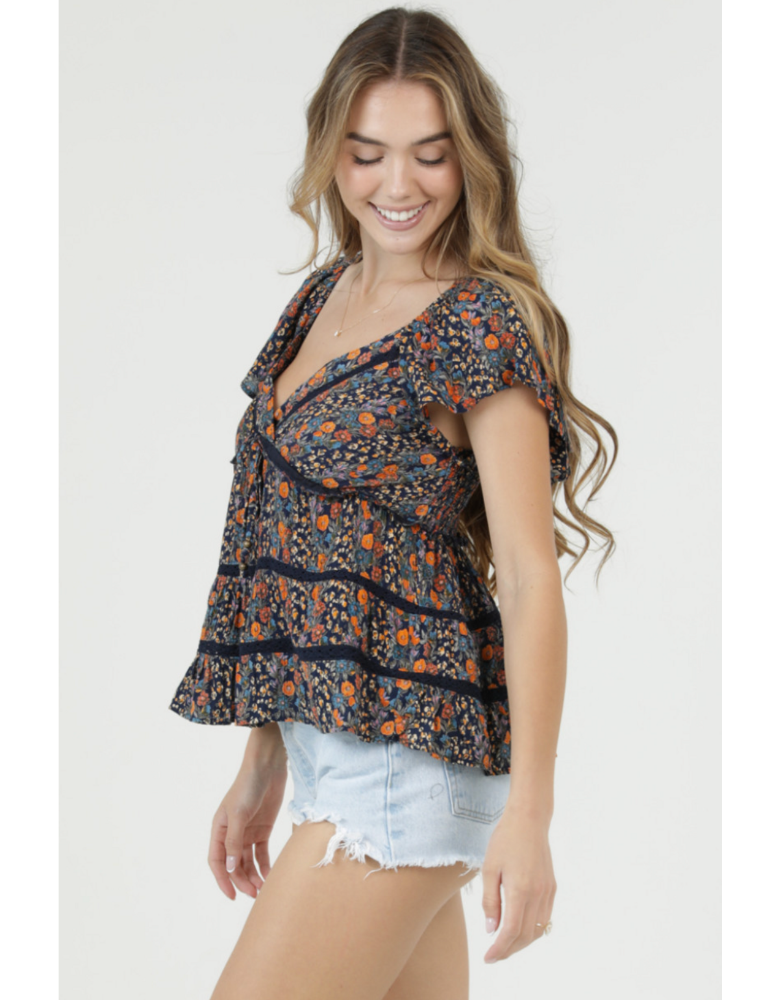 Flutter Sleeve Top with Ruffle Detail and Crochet Trim (Navy)