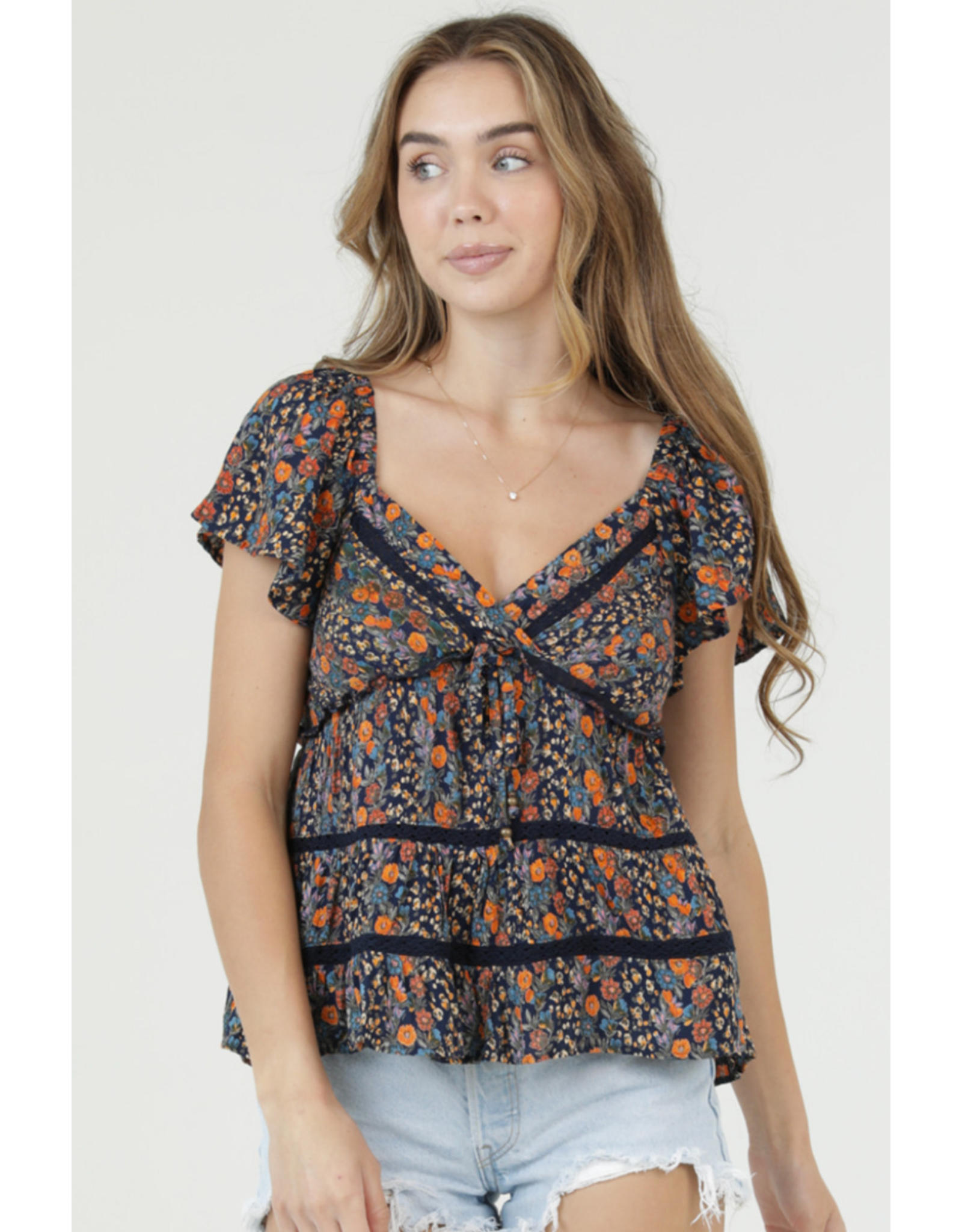 Flutter Sleeve Top with Ruffle Detail and Crochet Trim (Navy)