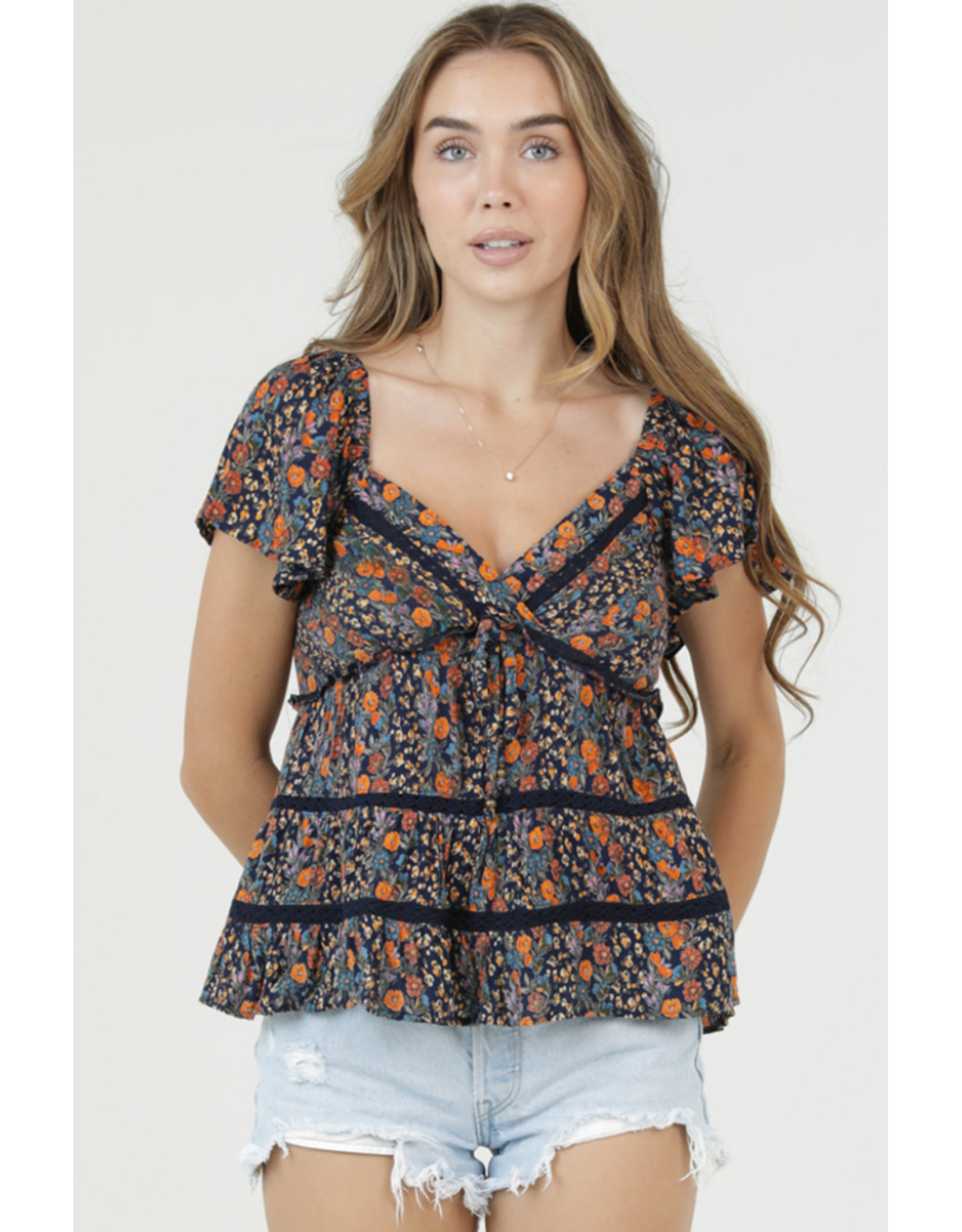 Flutter Sleeve Top with Ruffle Detail and Crochet Trim (Navy)