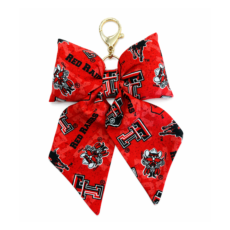 The Pemberley Market Logos Bow Purse Charm - Gold Clasp