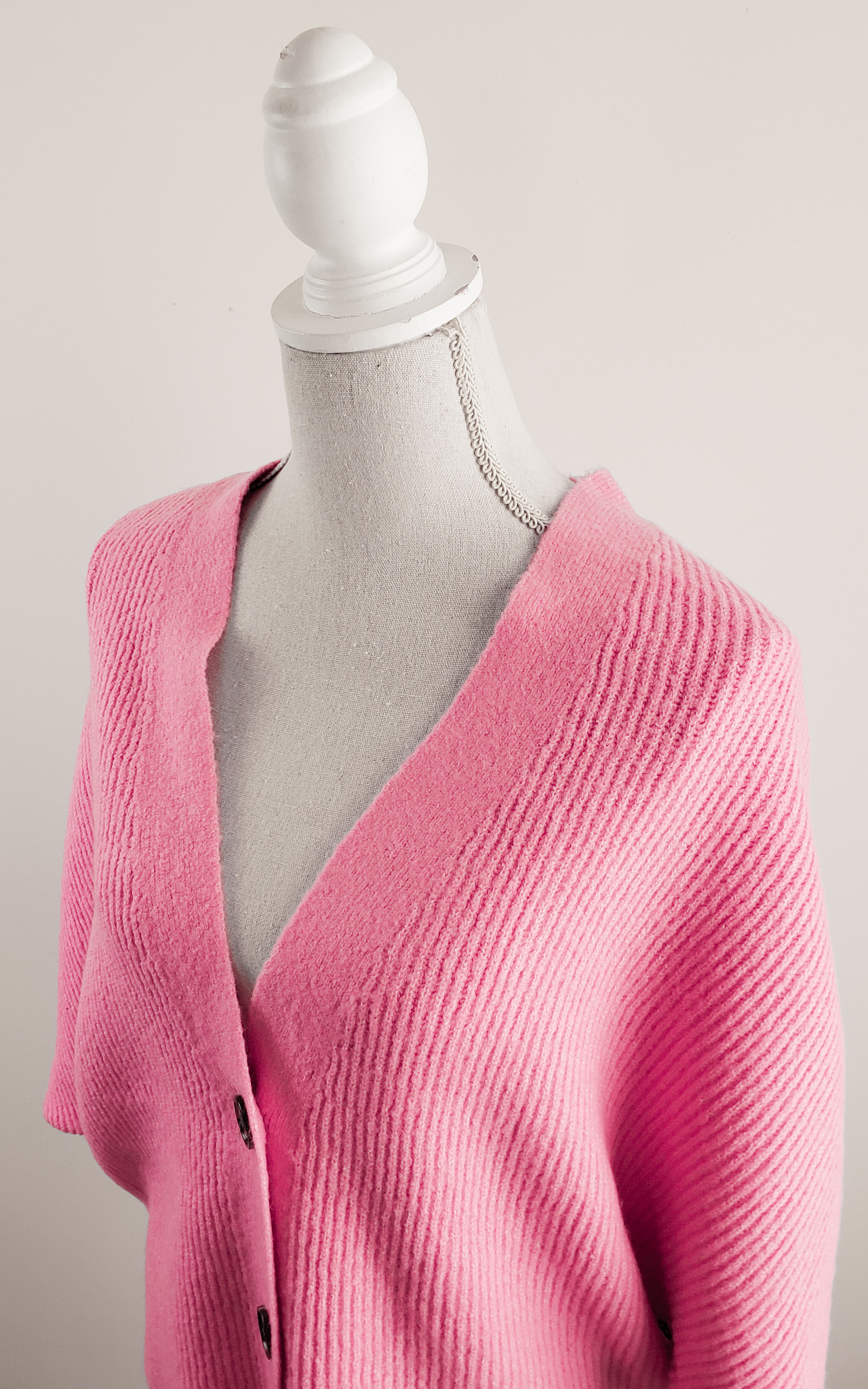 Bright pink oversized shop sweater