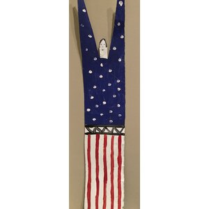 R.A. MILLER SIGNED TIN FIGUREOF MAN WITH ARMS RAISED DRESSED IN RED, WHITE AND BLUE