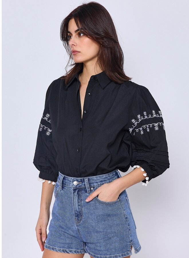 Embroidery blouse with pompom sleeves
