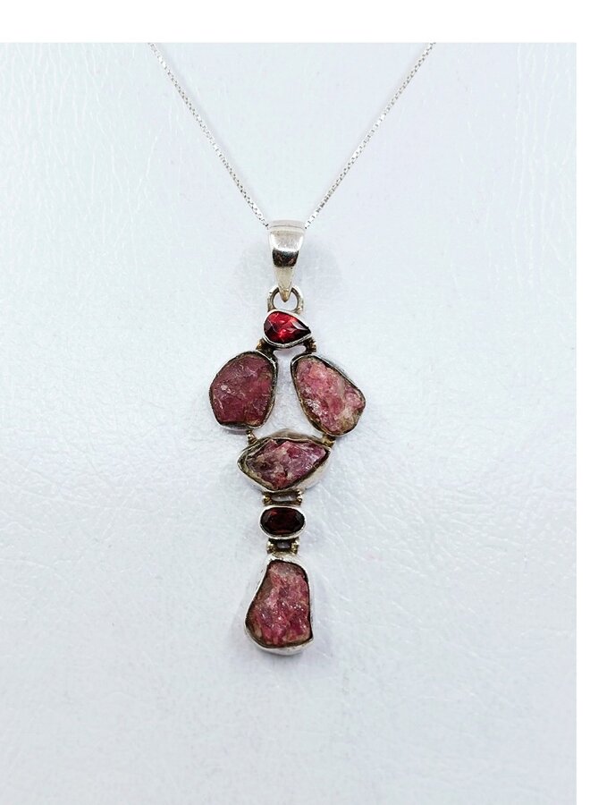 raw tourmaline and garnet pendant