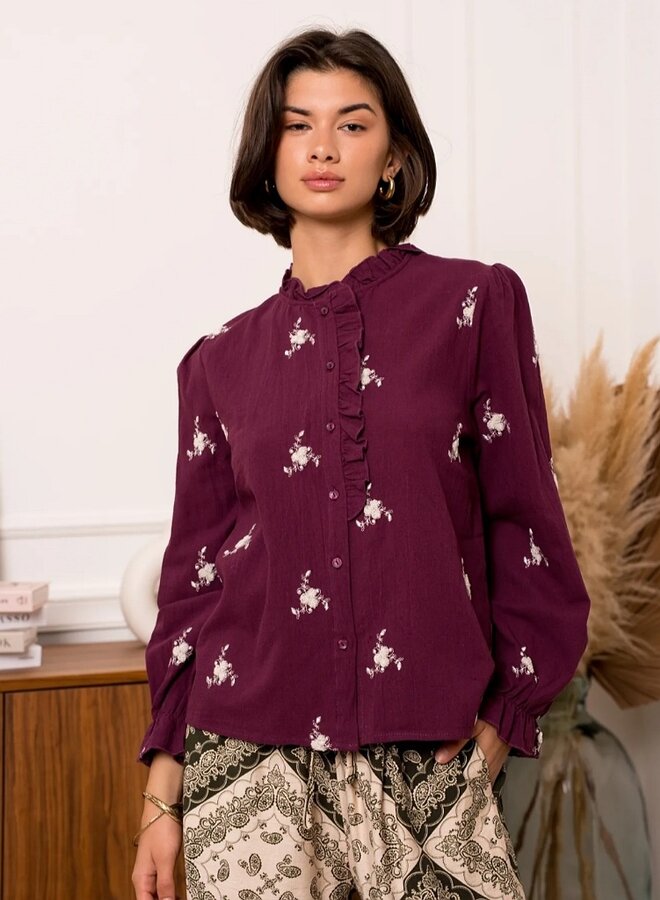 Embroidered ruffle blouse