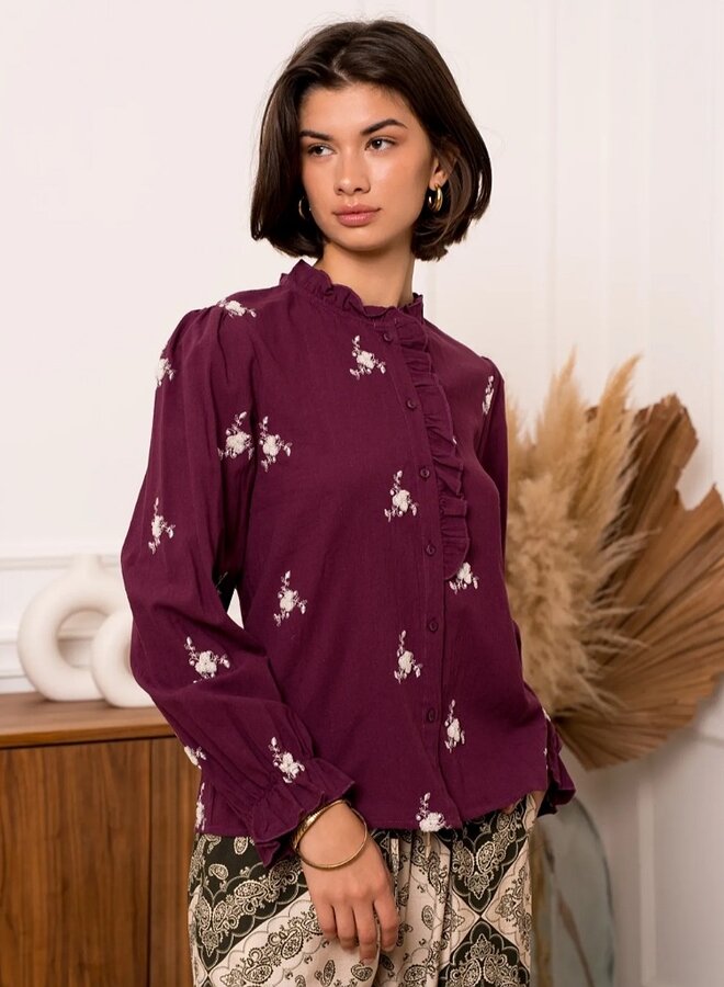 Embroidered ruffle blouse